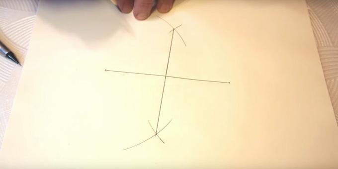 Como desenhar uma estrela de cinco pontas: desenhe uma linha vertical