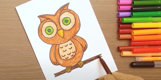 Como desenhar uma coruja: pintar sobre os olhos, pernas e um galho