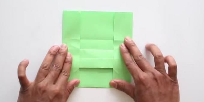 envelope com as mãos sem adesivo: dobre os lados