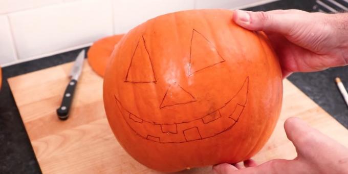 Halloween abóbora com suas próprias mãos: desenhar um rosto